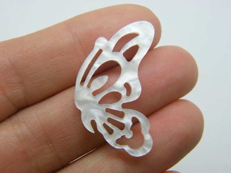 8 Butterfly connector charms resin white A488