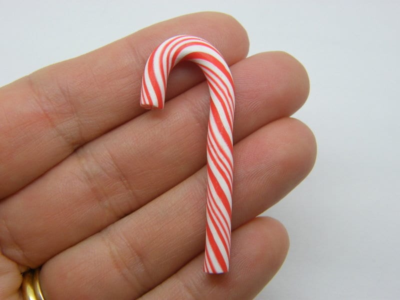 BULK 30 Candy cane Christmas embellishment miniature red and white clay FD691