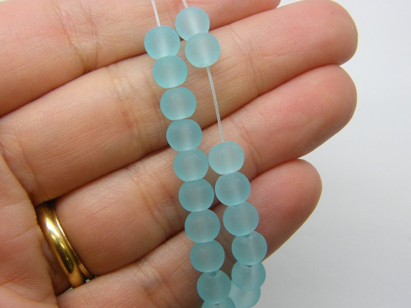 140 Blue beads 6mm frosted glass B255