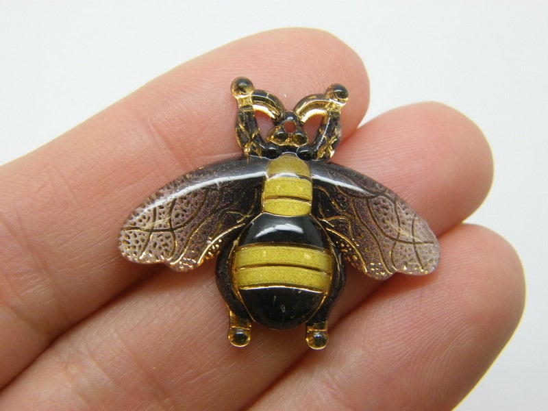 10 Bee pendants brown  acrylic A301