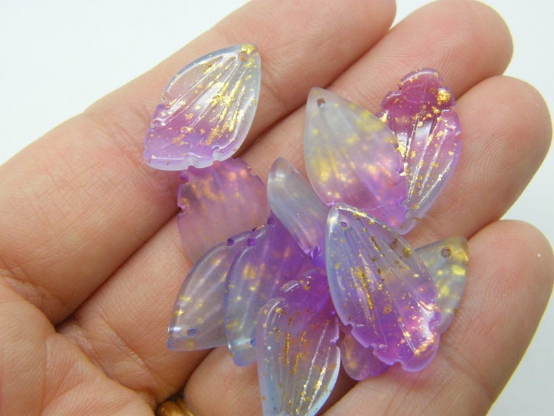 BULK 50 Flower petal leaf charms shades of purple glitter dust glass F458