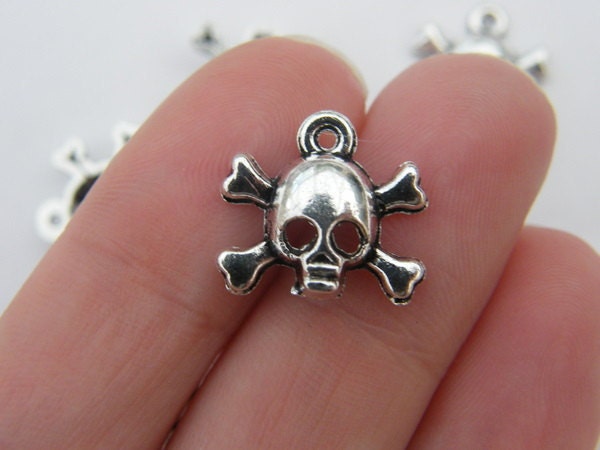 BULK 50 Skull and bones charms tibetan silver HC117 - SALE 50% OFF