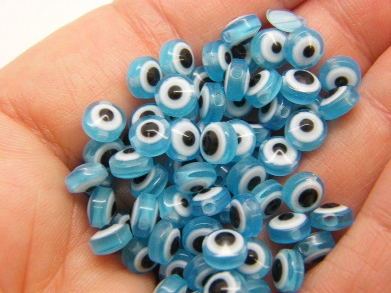50 Evil eye 6mm beads light blue resin AB418
