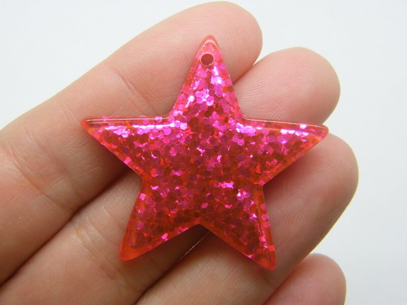 4 Star fuchsia pink resin pendants S182