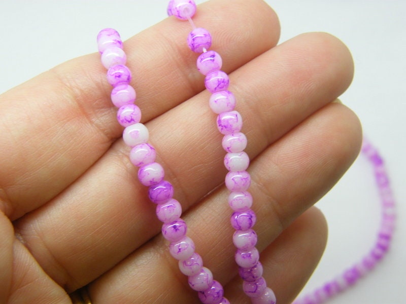 180 Purple mottle  glass beads 4mm B265