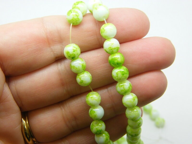 130 Light green mottle  glass beads 6mm B260