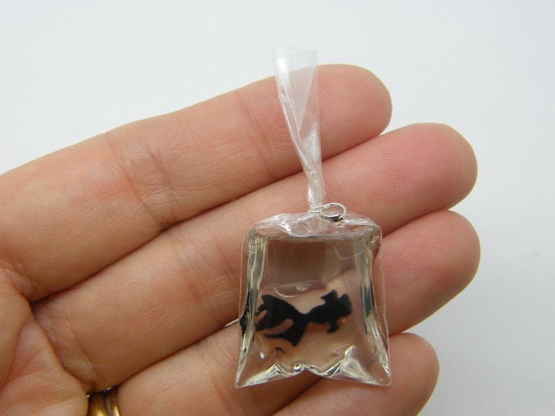 2 Resin black fish in a bag charms FF264