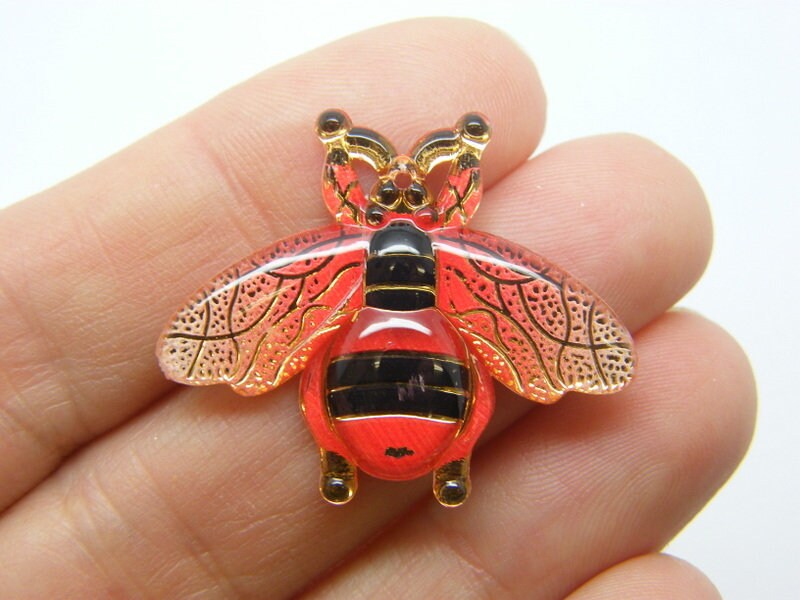 10 Bee pendants red acrylic A1258