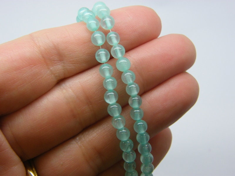 180 Imitation  jade beads aquamarine 4mm glass B179