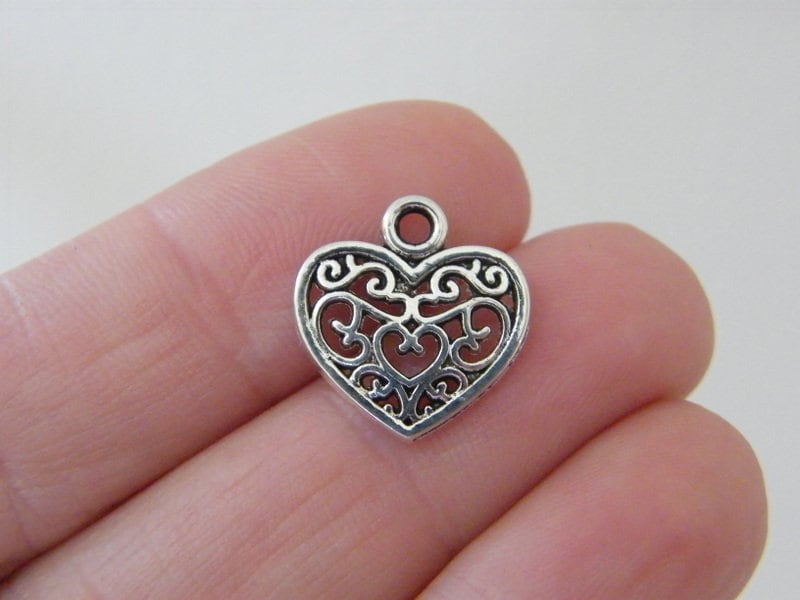 10 Heart charms antique silver tone H266