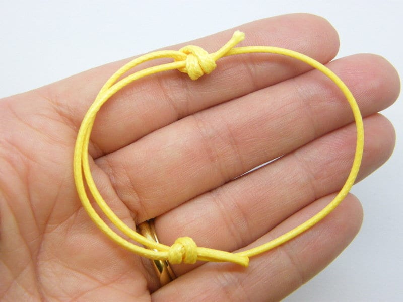 8  Waxed cord knot yellow bracelet 18