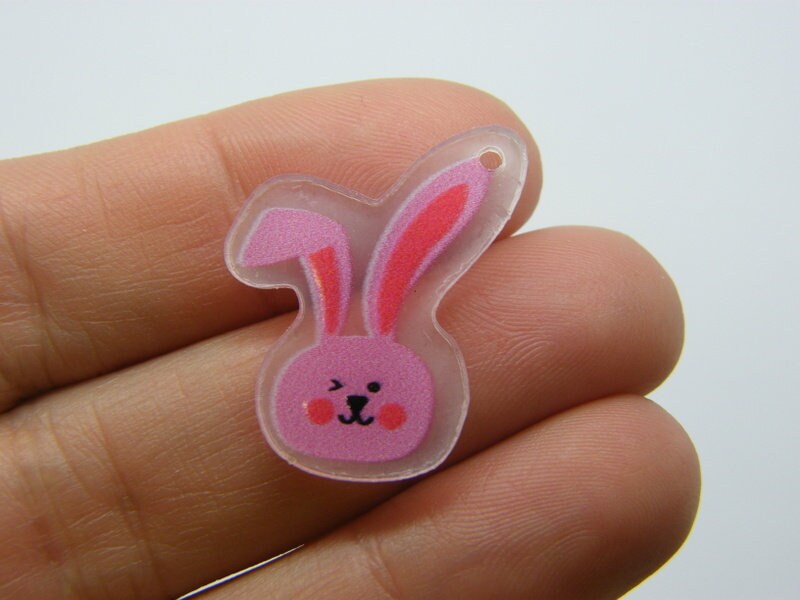 8 Pink rabbit charms resin A1228