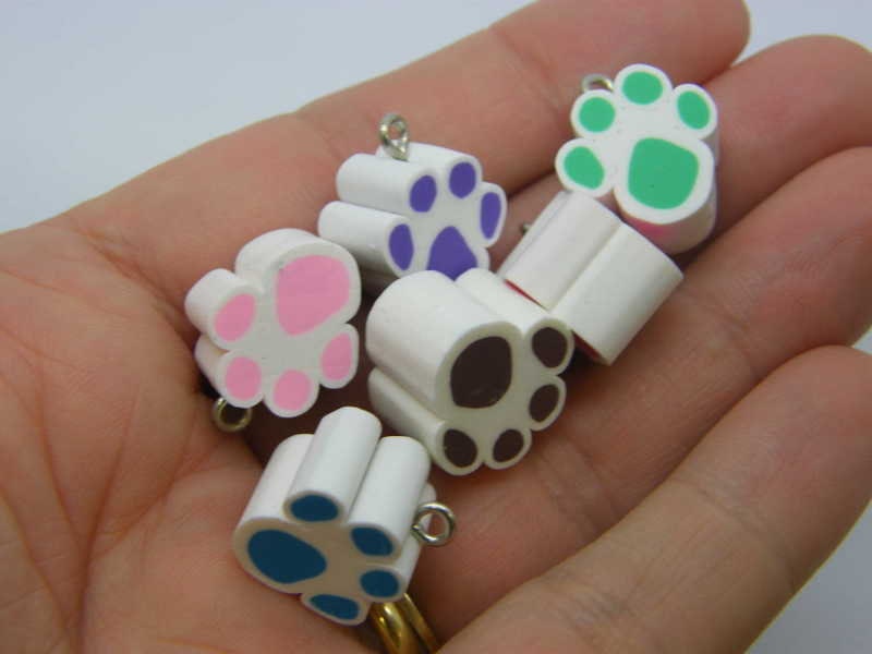 24 Paw print charms random white and mixed polymer clay A961