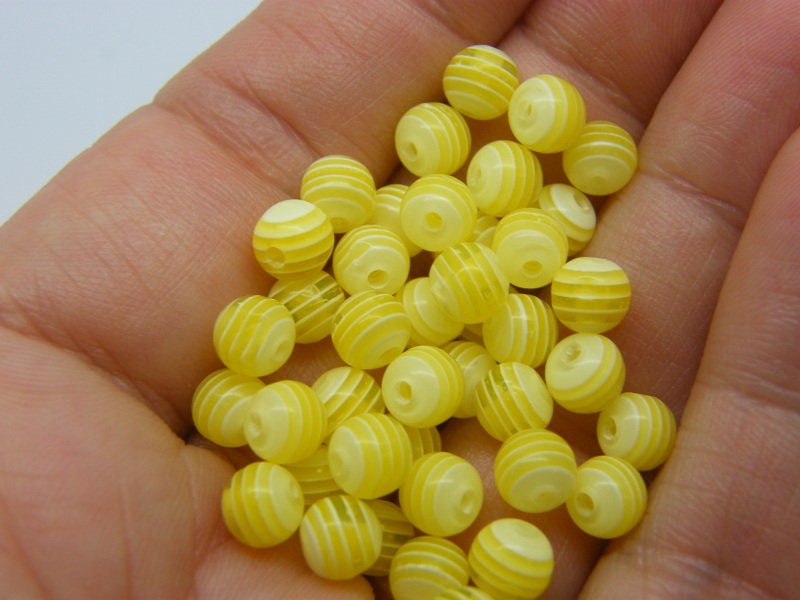 100 Yellow striped beads 6mm resin AB453