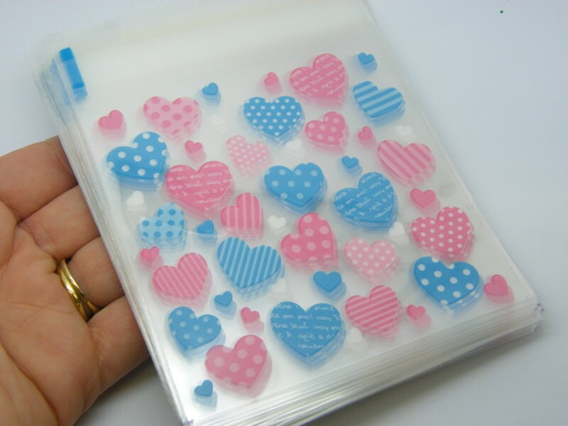 96 Plastic bags packets hearts pink blue self sealing 10 x 10cm