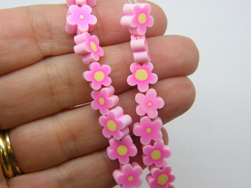 36 flower beads pink yellow polymer clay B271
