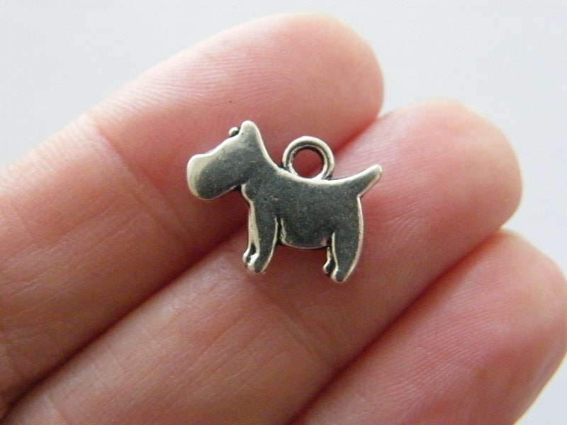 10 Dog charms antique silver tone A1073