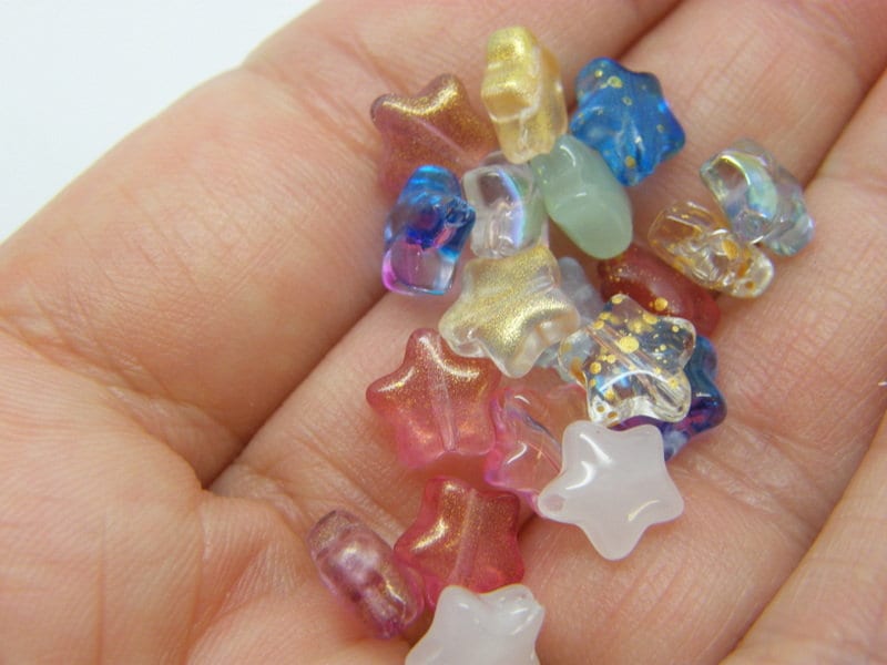 30 Star beads random glass AB437