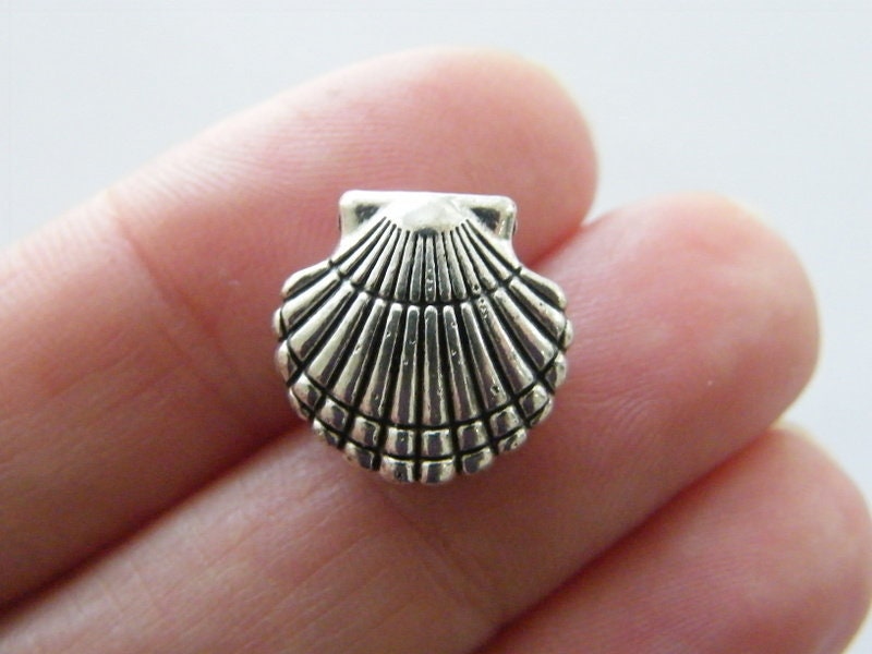 8 Shell spacer beads antique silver tone FF92