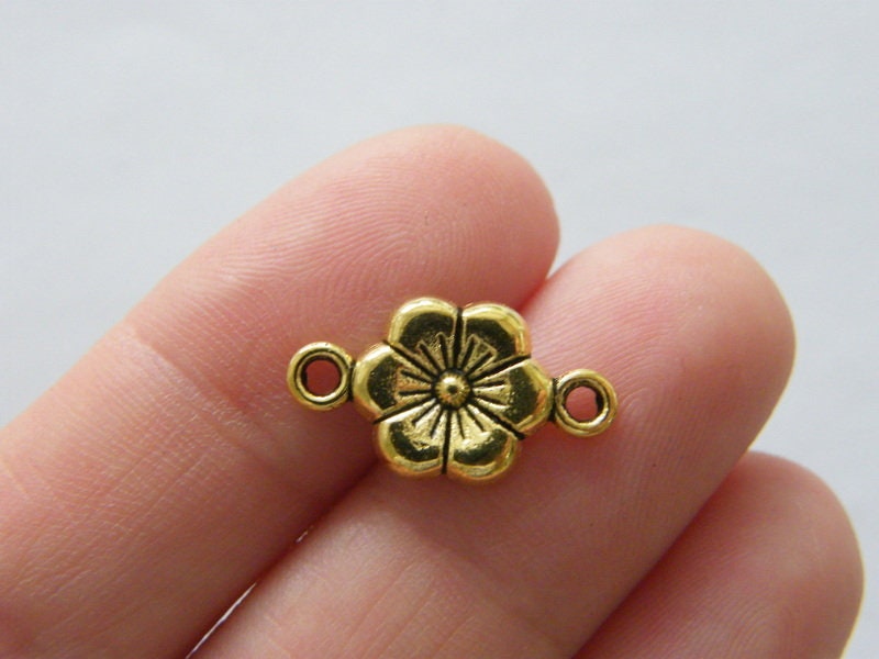 12 Flower connector charms antique gold tone F309