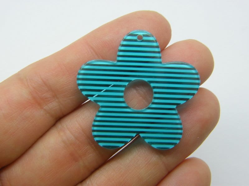 8 Flower pendants clear and blue stripe resin F596