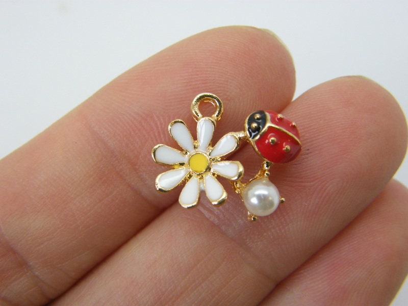 4 Ladybug and flower charms gold tone A615