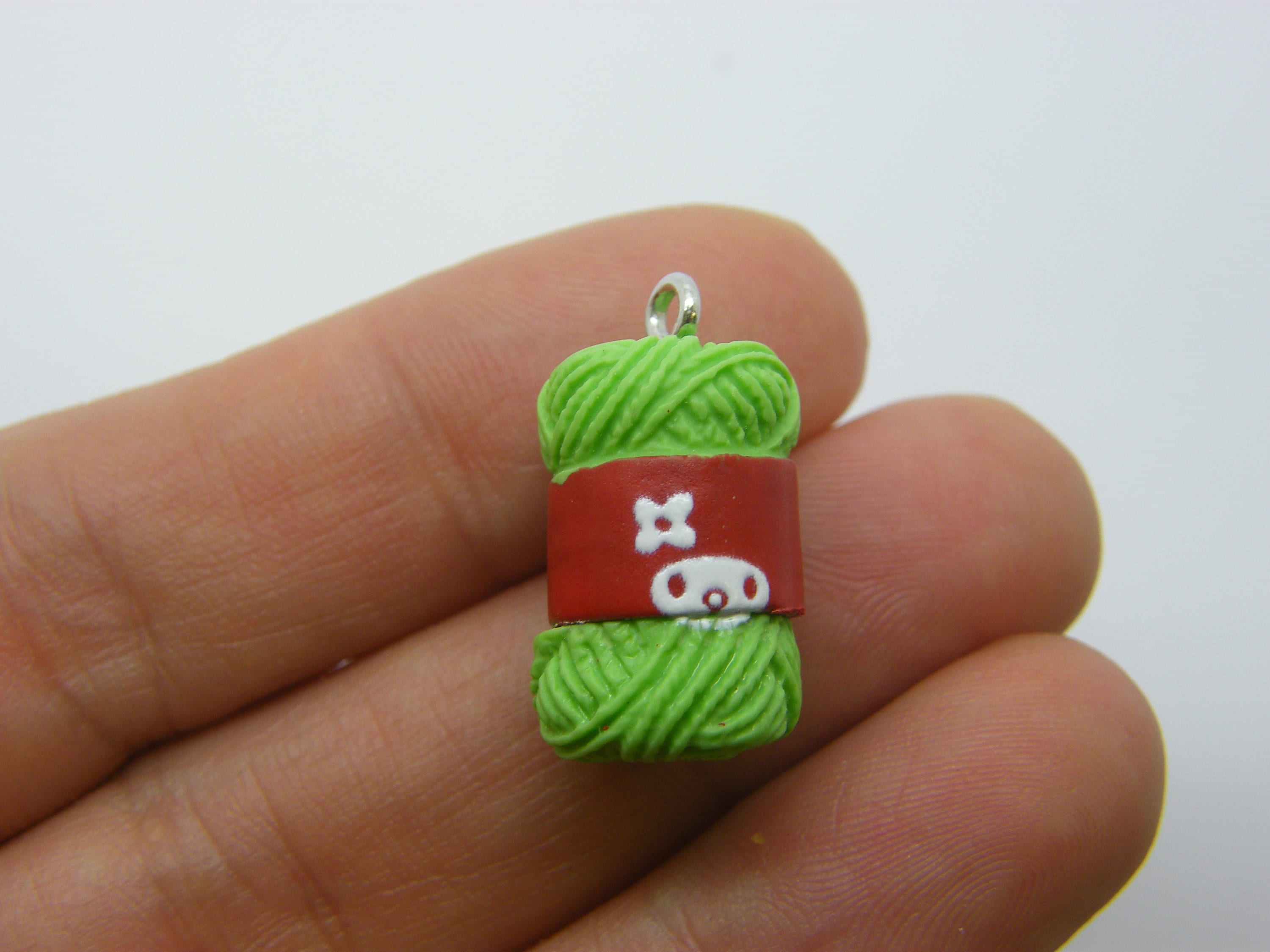 2 Balls of wool yarn pendants green resin P249