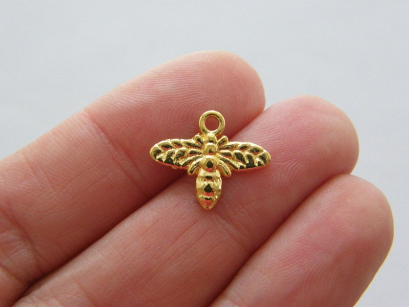14 Bee charms bright gold plated tone A299