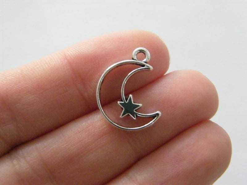 10 Moon star charms antique silver tone M110