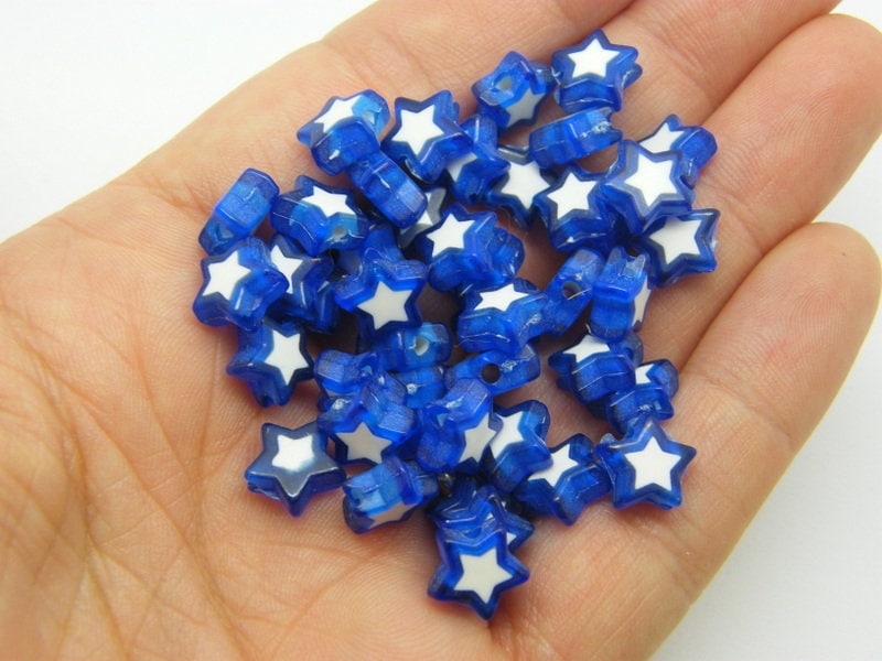 100 Star bead royal blue white acrylic AB497