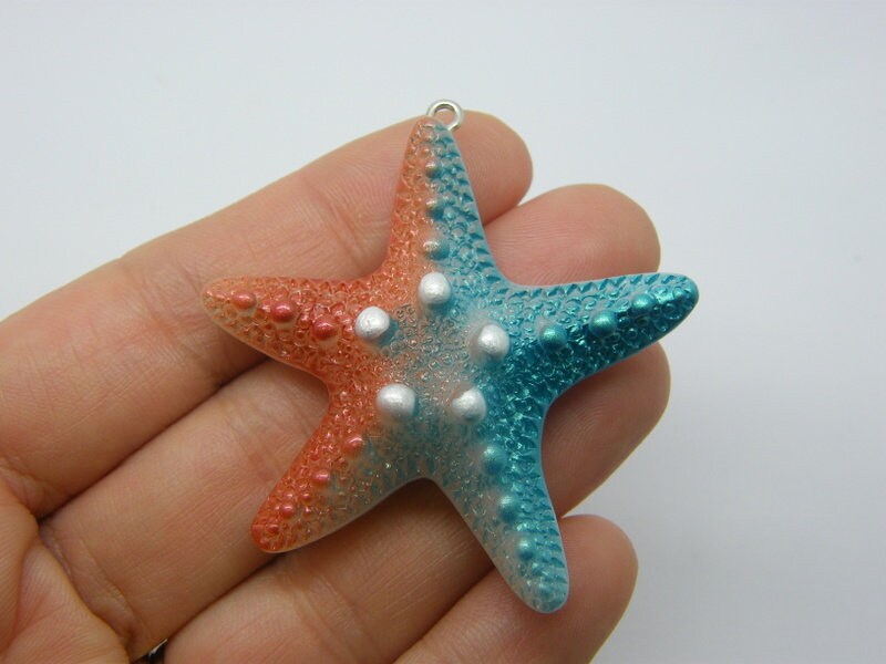 2 Starfish pendants rust red blue resin FF730