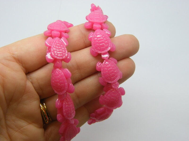20 Turtle spacer beads synthetic resin dark pink FF