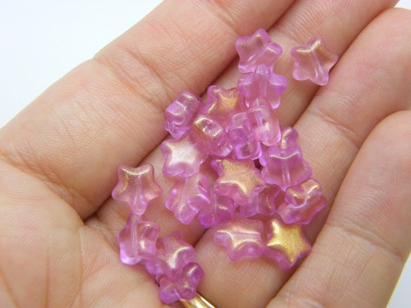30 Star beads AB pink glass AB492