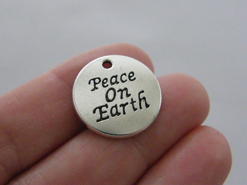 16 Peace on Earth charms antique silver tone M563