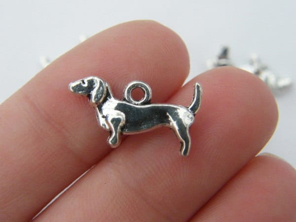 10 Dachshund  sausage dog charms antique silver tone A1054