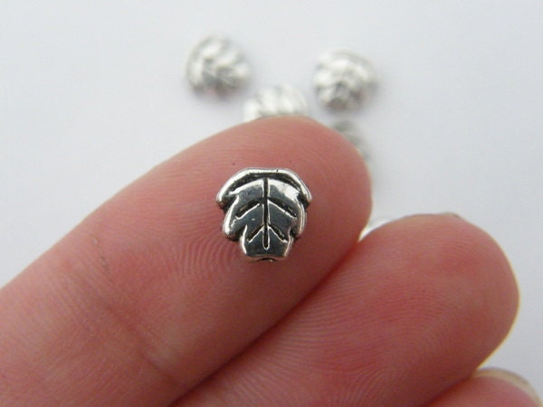 14 Leaf spacer beads antique silver tone L31
