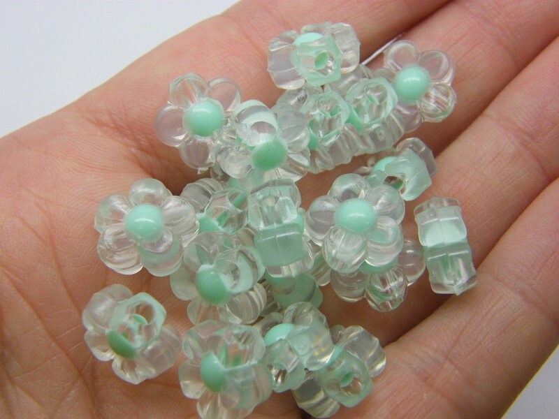 40 Flower beads clear and green acrylic BB308