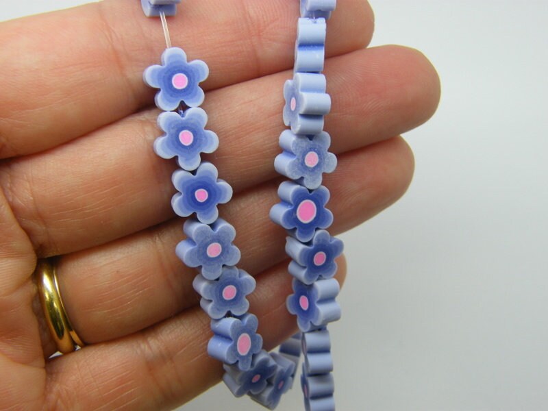 36 flower beads purple pink polymer clay B112
