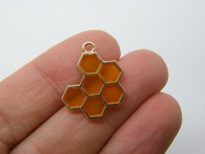 8 Honeycomb charms orange resin and gold tone A534