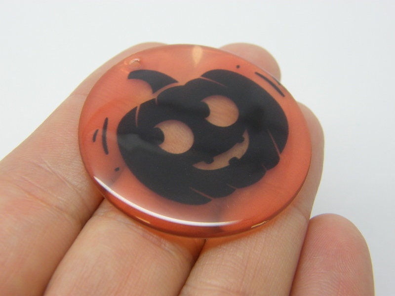 4 Pumpkin Halloween pendants transparent orange black resin HC639