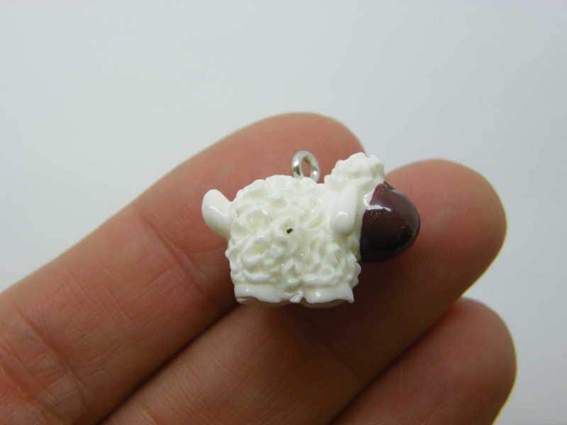 6  Sheep pendants white resin A1312