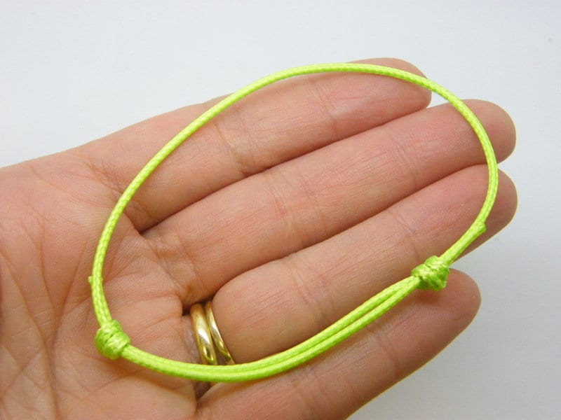 8  Waxed cord knot neon green bracelet 17