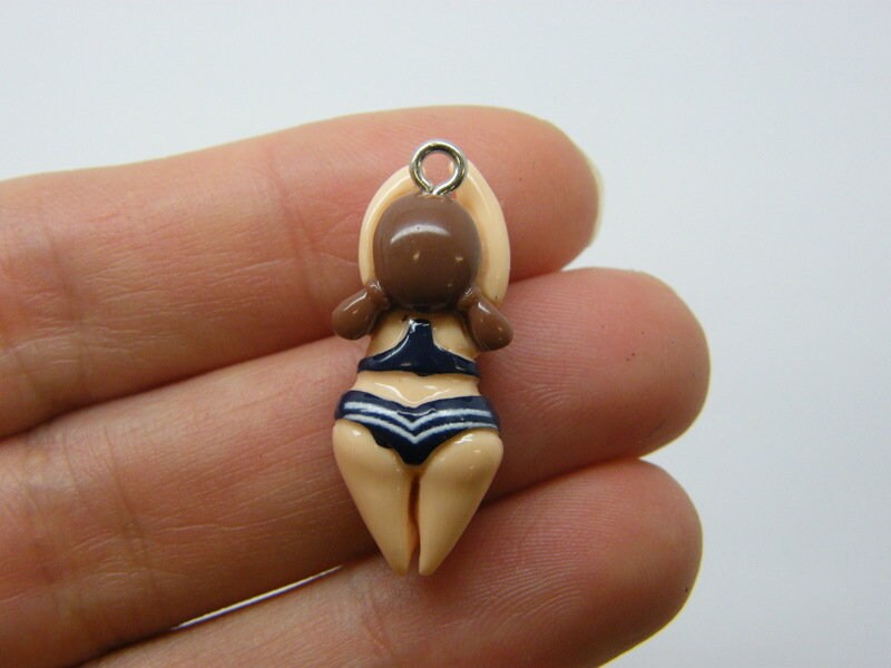 2 Swimming girl charms resin SP94