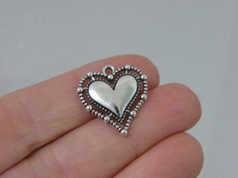 8 Heart pendants antique silver tone H38