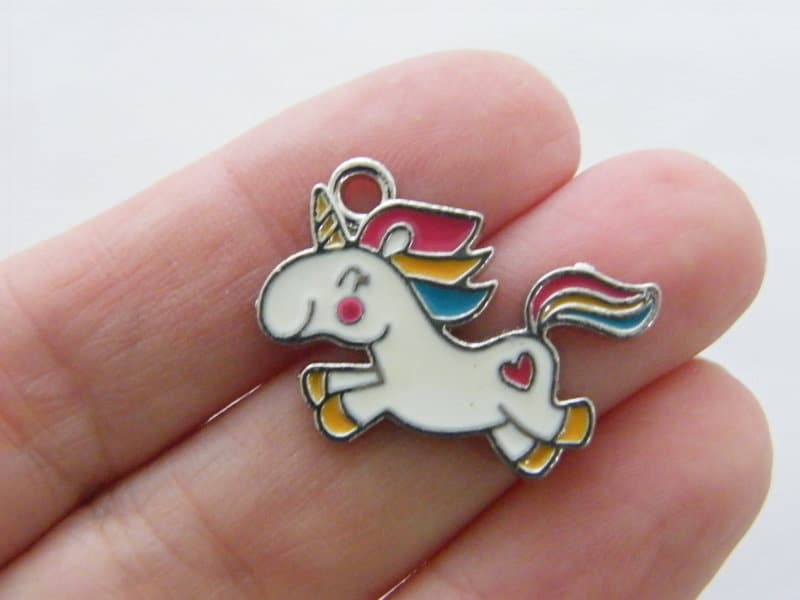 4 Unicorn charms white and silver tone A1118