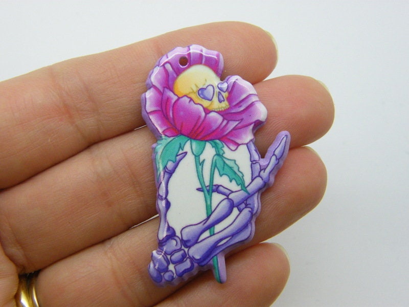2 Skeleton hand flower pendants acrylic HC824