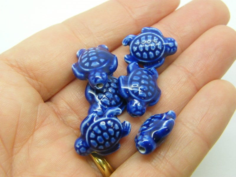 8 Turtle beads royal blue porcelain FF424