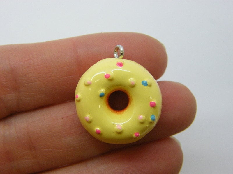 4 Donut charms brown yellow resin FD782