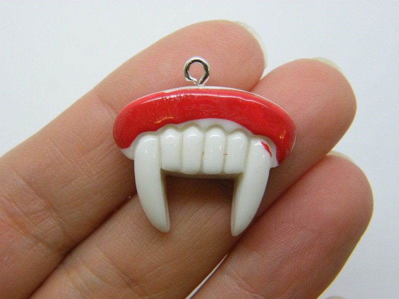 2 Vampire fangs pendants resin HC848