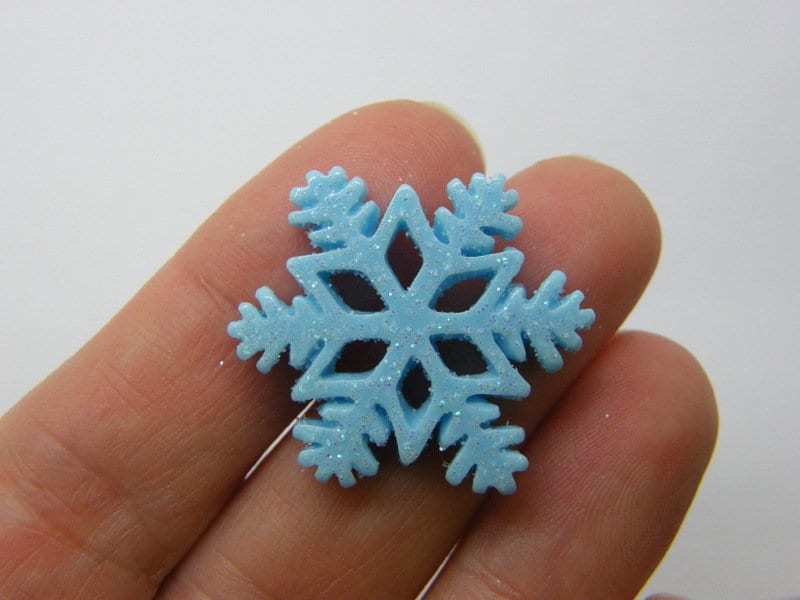 10 Snowflake embellishment cabochons blue glitter CT334